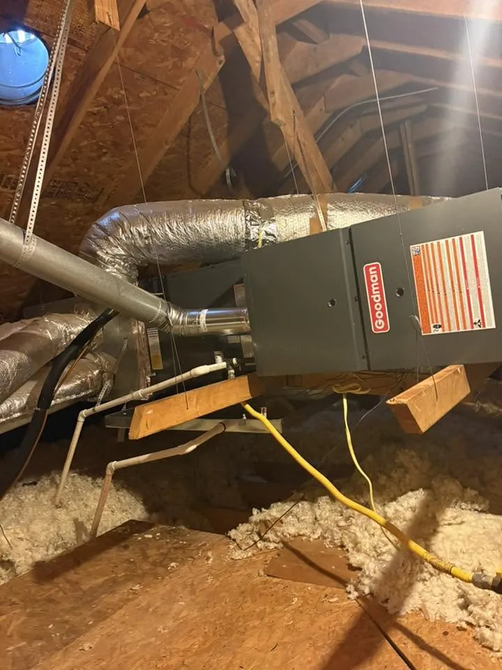 Furnace and flex duct in an attic with blown insulation